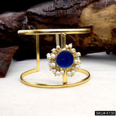 Elegant Gold Cuff Bracelet with Blue Stone and Pearl Accents