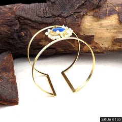 Elegant Gold Cuff Bracelet with Blue Stone and Pearl Accents