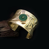 Gold Plated Hammered Design of Cuff With Green Power sign SKU7002