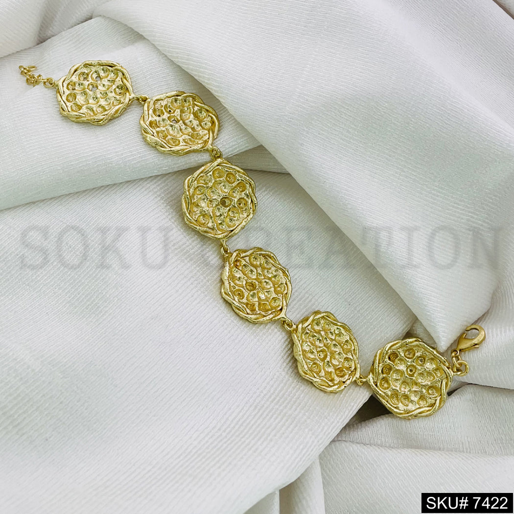 A Unique Designer Party Era Bracelet in Gold Plated SKU7422